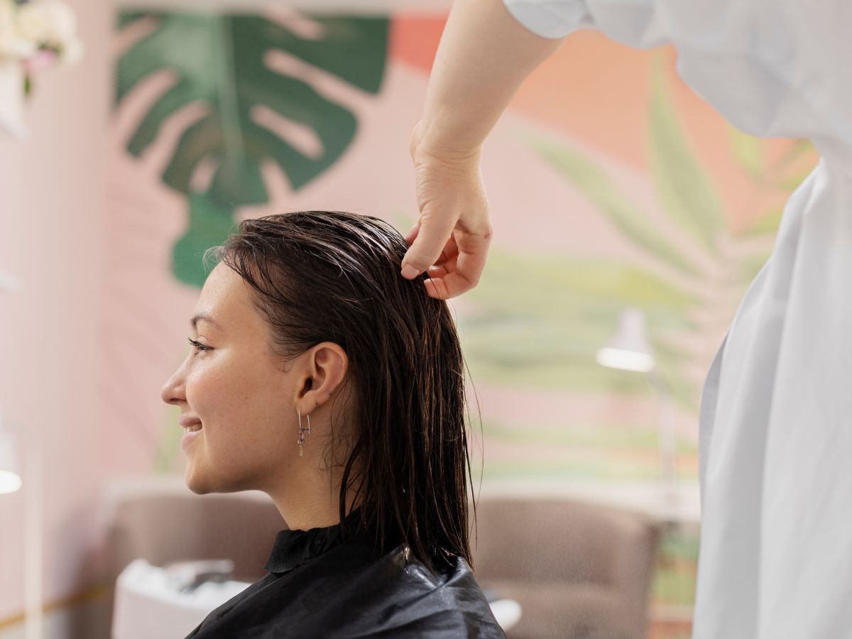woman in salon for scalp treatment