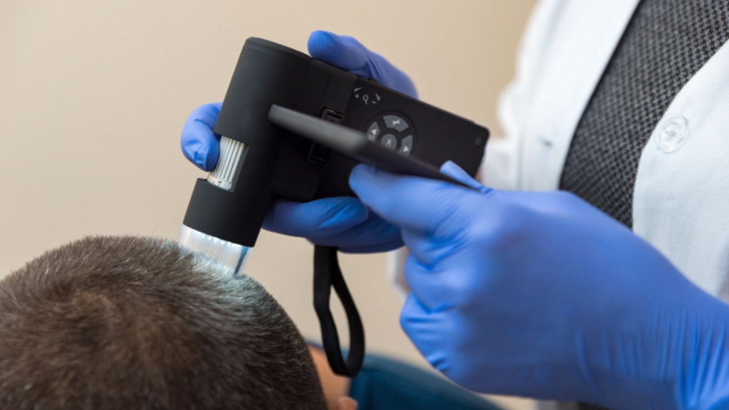 Close-up of scalp analysis during herbal hair treatment in Singapore